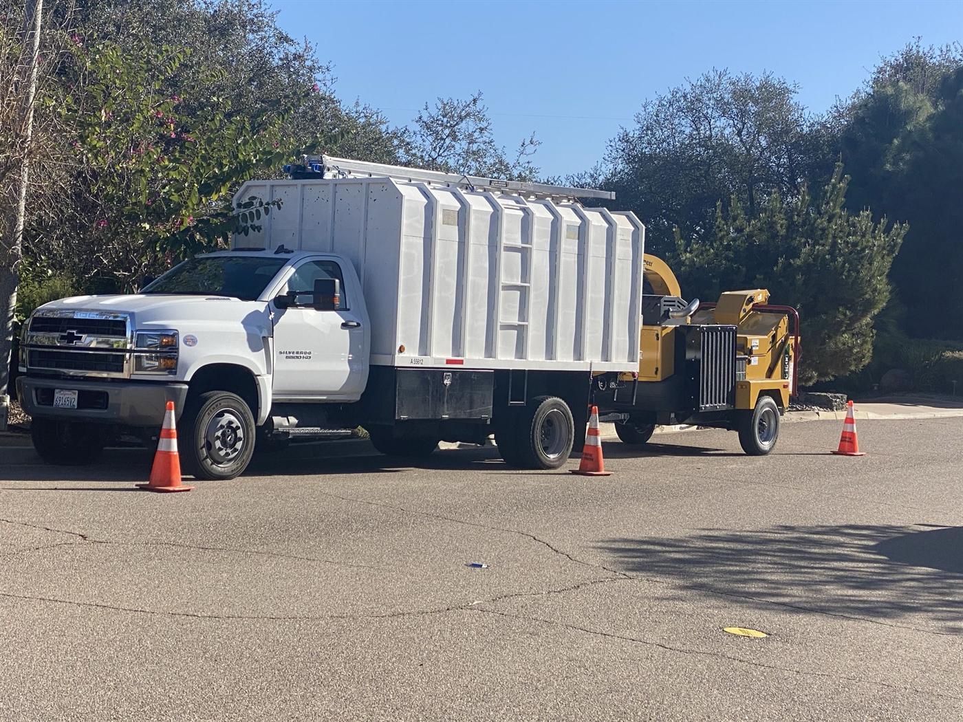 Artistic Solutions chipper truck staged for tree work